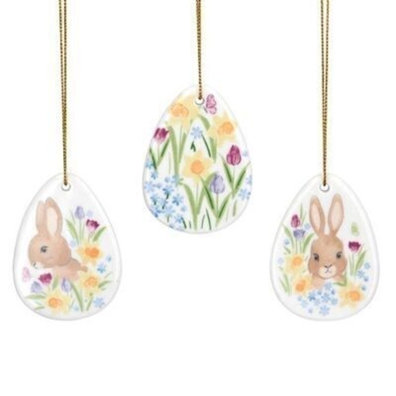 White Ceramic egg shaped hanging decoration with bunny and daffodil design. The perfect addition to your home for Easter and Spring. 3 designs. By Gisela Graham.
